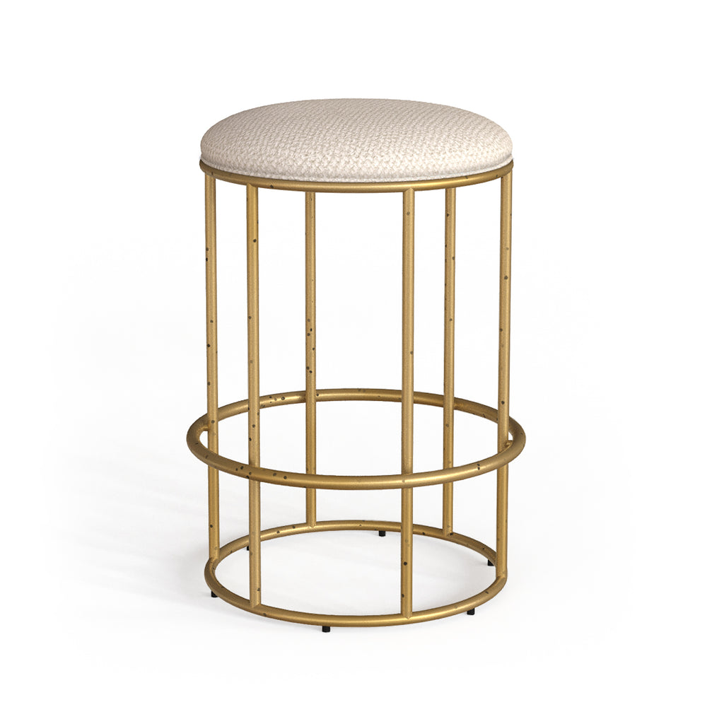 Wesley Allen NYX backless barstool in Hammered Brass finish with French Ivory fabric.
